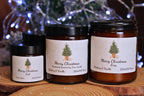 Three different sizes of personalised Christmas tree candles displayed together to show the product range