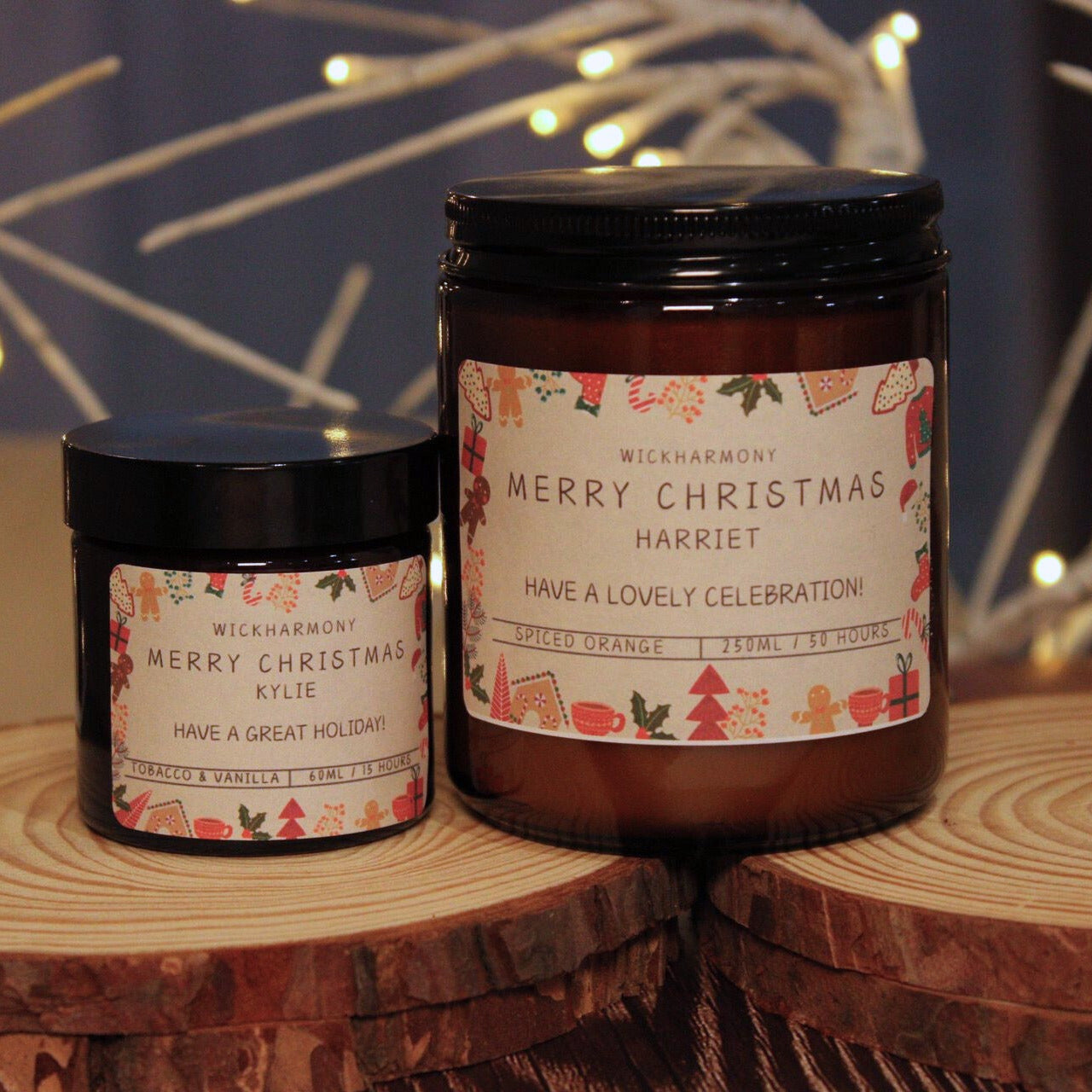 A small 60ml and a large 250ml personalised soy candle side-by-side, showcasing the size difference against a festive background.