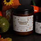 Two WickHarmony soy candles, a 250ml and 120ml jar, showing 'The Autumn Breeze' minimalist leaf design