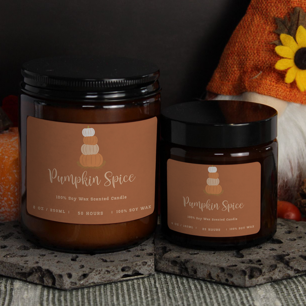 Two WickHarmony candles, 250ml and 120ml, showing 'The Cosy Sketchbook' design with the Pumpkin Spice illustration