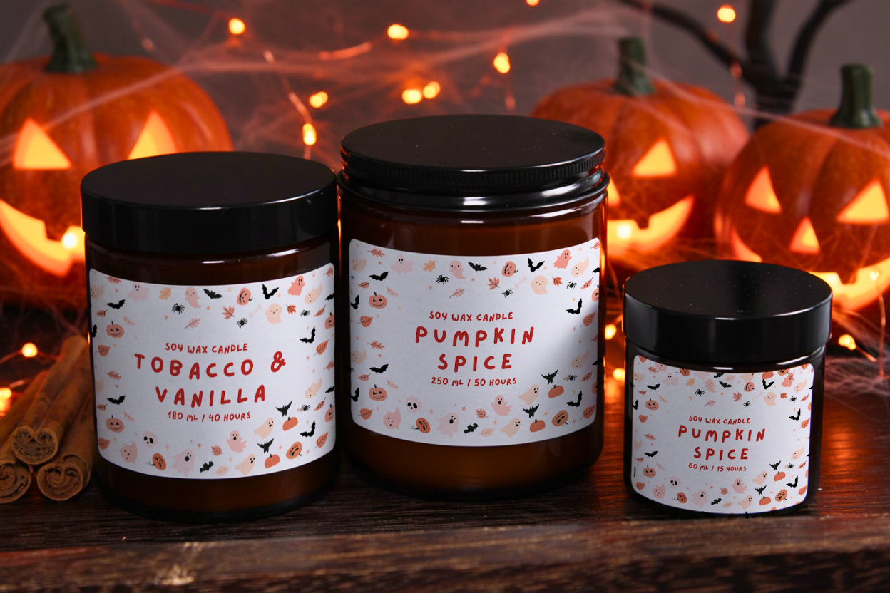A collection of three WickHarmony candles in different sizes, all featuring 'The Halloween Party' cute and spooky label design