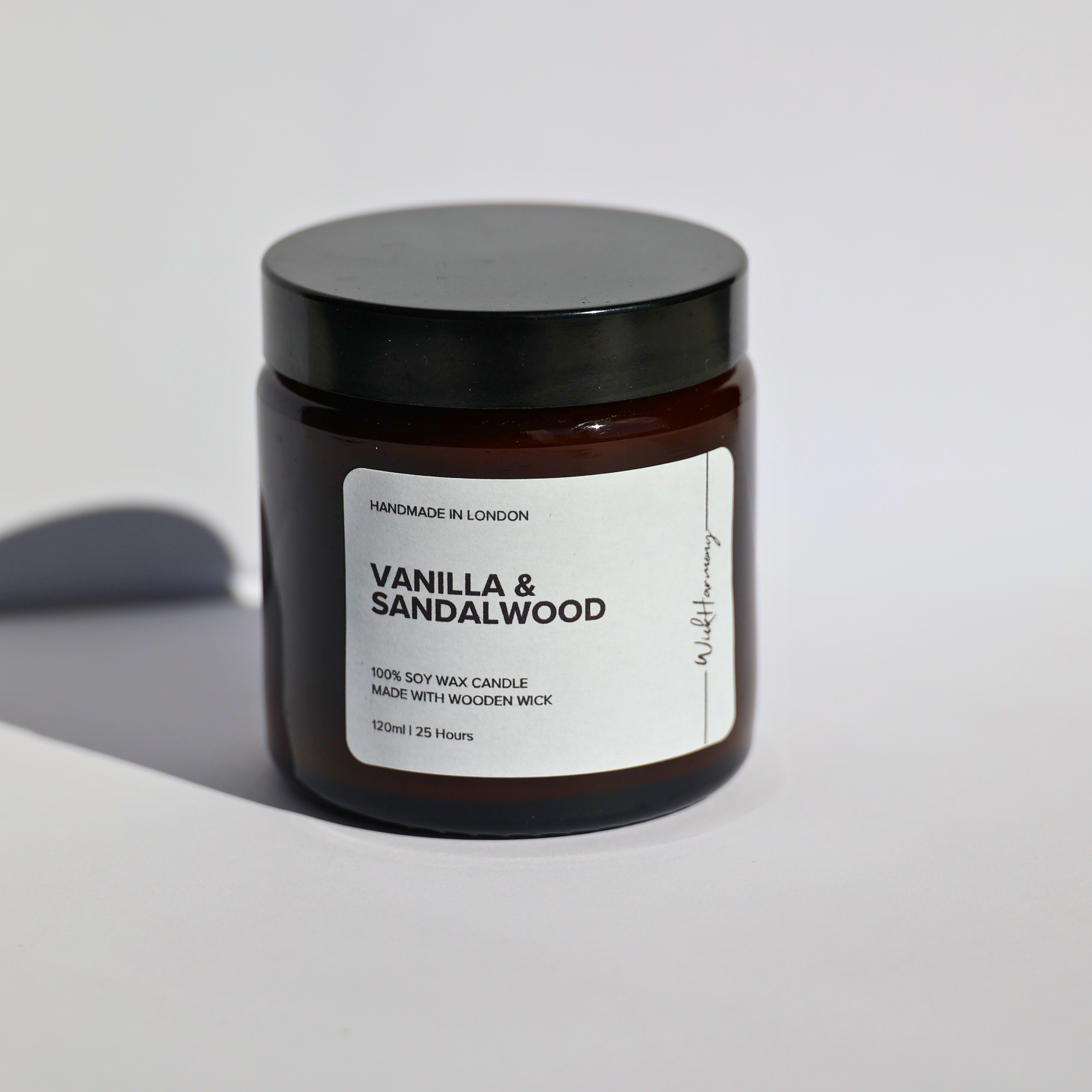 A studio product photo of the 120ml 'Vanilla & Sandalwood' soy wax candle by WickHarmony, shown against a plain white background.